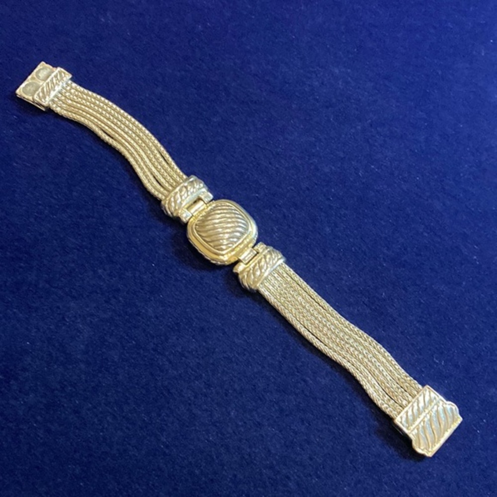 Silver tone ribbed center  multi strand magnetic bracelet